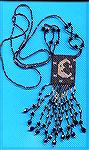 Necklace beaded by Sue Sommerville and presented to me for Christmas 2001.  The scan doesn't do it justice - it is GORGEOUS! This was Sue's first effort.  She used the tubular peyote stitch.

Beaded