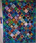Catriona Stirling made this smashing quilt and won a ribbon at a show in Scotland.  The picture was taken by Marie-Louise, a former CISter.  I think her use of color is terrific and well deserved the 