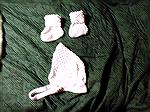 These are the bonnet and booties I designed to match the christening gown.
