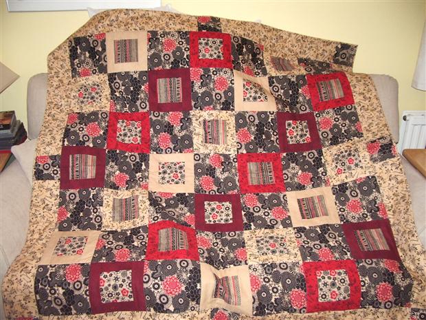 red, black & tan quilt