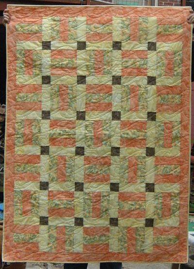 yellow and orange quilt