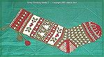 This is the 2nd class model Christmas Stocking. Here the main pattern of trees is essentially from a commercial pattern with some modifications. Both socks have "peasant heels" (knit in last after rem
