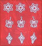 These angel, icicle and star ornaments were machine-embroidered on a Brother PE-150 embroidery machine with Madeira 60 wt. rayon embroidery thread. These embroidery designs are from the Mini K-Lace:  