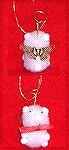 Hi, 

My name is Colleen Poor and my little angel bear is my own design. Every year I make these type of ornaments pompoms. Hope you enjoy him.2001 Orn. Swap/Colleen PoorColleen Poor

2001 Ornamen
