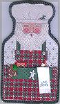 Needlepoint ornament designed by Rosanne Moss, done on canvas with some specialty stitches and fibres.  The plaid apron was a challenge for me anyway!  He was worth all the work.Baker SantaLorrie Gaut