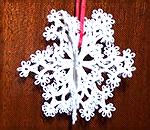 This is a tatted 3 dimensional snowflake designed by Vida Sunderman.  It is tatted in size 20 crochet cotton.Wendy's tatted snowflakeWendyDurell