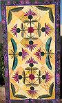 This is a quilted wall hanging by Lynette, my sister's friend.  Machine pieced and quilted.Lynette''s Thistle Wall HangingKathyMorgret