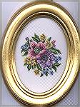 Petit Point flowers picture made and purchased in Vienna, Austria.  There are 1600 stitches per square inch.Petit Point FlowersKathy Chelsen