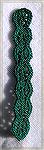 This is a crochet bookmark that was worked by Dawn Wheeler for our 2002 bookmark swap. This Wheel Bookmark was designed by Lisa@crochetnmore.com. Found at http://www.crochetnmore.comBM2002Swap17Kyra T