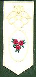This is a  bookmark that was machine embroidered by Kyra Tenpenny for our 2002 bookmark swap. I used a bitmap from my Pre-Design software that I got from Loes van der Heijden at http://www.artistitch.