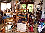 In this shot you can see my cone tree (which I love) in the back left corner of the room. I also have shelves above the windows for cone storage. The windows on the left are where my hydroponic cotton