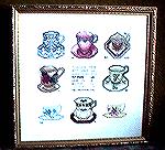 This was our third and last round robin and was of Teacups. Most of us used charts from the Tiny Teacups booklet, but Sharon designed the two very tiny ones herself. Stitchers were Sharon MacKay, Pat 