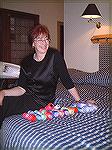 This is Ruth with her colorful yarns bought at Venne in Holland.Ruth pleased with her shopping.AnsDrost