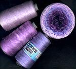 Here are some cotton yarns from Venne-Colcoton Unikat.  The gradiant ball of yarn is made of six strands of cotton gently twisted together; the cones hold single strands.  Venne yarns are carried in N