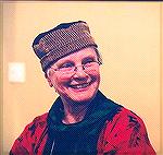 Hildburg Langen wearing a hat of her own making.  At Complex Weavers Seminars 2002.Hildburg and her hatRuthMacGregor