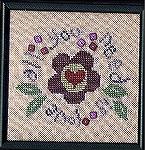 This was a Freebie Design I stitched in 2001All You need is Love FreebieCathy Caldwell