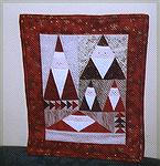 This is the miniature I made for the Edinburgh Quilters 1999 Christmas challenge. We had to use part of a seven inch square cream with gold fabric in anything we wanted to. I'd been meaning to make th