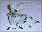 Colleen Poor's ornament in our 2002 Holiday Ornament Swap.  This little mouse is Colleen''s own creation and he comes complete with lights!Colleen Poor ornament 2002ChristinaNorton