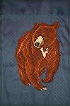 Bear cross stitched on a shirt using waste canvas.  I Do one of these for my son every year for Christmas.  Cross-stitch bear on shirtKaren Willett