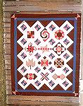 This is the sample quilt top for the Intermediate Technique Builder BOM I teach at Front Porch Quilts in Houston Texas. The 12 blocks in double pink and dark brown are the blocks the students make in 