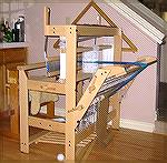 This is a side shot of my new Louet David loom. This is such a SWEET weaving loom - quiet, easy to treadle, nice big sheds. I really love itLouet David SideDeanna Johnson