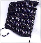 A WIP - a little beaded knitted pendant bag