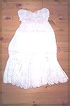 My daughter Mandy's Christening gown.  I crocheted this in sewing thread, not using a pattern, just making it up as I went along. I doubled the thread at the bottom to make it thicker.