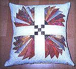 This is a cushion I made for the Edinburgh Quilters Challenge 2002. We had to use the black fabric that is the handle of my fans in any item we wanted and I chose to use it with hand marbled fabrics I