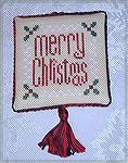 Nancy made a &quot;Merry Christmas&quot; cross-stitch from the 2003 JCS Ornament issue.  The designer is Glory Bee.  From our 2003 Holiday Ornament Swap.