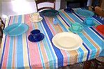 Here's the tablecloth I wove for my mother, along with some of her Fiesta Ware. I matched colors from the dishes for the stripes.
