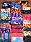 Here are the 33 batiks I collected from my participation in Atlanta's 2004 Quilt Shop Hop.  I arranged them for contrast and variety.  See the other picture for my daughter's transitional arrangement.