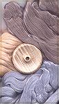 Here is a scan of the merino/tencel blends I bought at the MD festival this year - called Shadow, Truffle, and Champagne. You can also see the fancy maple whorl of my new spindle, which I didn't reali
