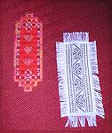 Karen's wonderful bookmarks were submitted for our 2004 Beverly Marchetti Memorial Bookmarks for Literacy Swap.  The red one is done in hardanger using Watercolours Pomegranate and Sampler Threads Pop