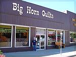 Laura Smith standing in front of Big Horn Quilts in Wyoming