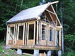 For those who asked, here's what I've been doing this summer instead of weaving. &lt;g> It's a small cabin with a loft and LOTS of windows, sitting on 13 acres of woods in the Allegheny mountains of V