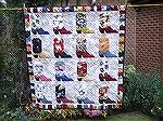 I began this quilt in 2000 by buying the Love of Quilting magazine that had the pattern, bought the fabric in 2001 at Houston (as it's difficult to get Western fabric in Scotland!) and completed the t