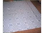 This is my second coverlet, the very heavy woven one from Canada. It's a wheel-type pattern, woven in two panels which are perfectly matched. This one's in much better shape than the first one and may
