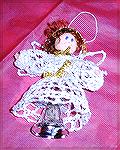This crocheted angel is by Becky Morgan. Becky says, "Her skirt is ornament #5 of the Iced Jewels collection (from freepatterns.com).  For the rest of her, I...er...winged it!" From our 2004 Holiday O