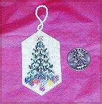 This little beaded ornament is by Wendy Durell.  From our 2004 Holiday Ornament Swap.