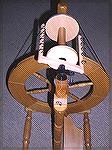 This shows the Louet bulky flyer and bobbin in place on a spinning wheel.  They're big, for spinning big yarns!  The drive ratios provided by this spinning head are  4:1, 5:1, and 6.5:1.
