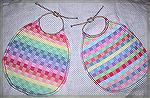 These two bibs were woven in 10/2 cotton, in twill blocks (1/3 and 3/1) on 8 shafts.

The kumihimo ties, also cotton, are &quot;kongo gumi&quot;, a firm, round braid.

