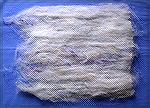 This is a batt (blending wool fiber and silk threads) after just one round of drum carding.

I think it looks much the same as a batt that comes off a hand card after the first round of carding.
