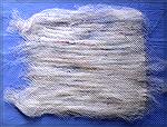 This is a batt (wool fiber blending with silk thread) after the second round of carding on a drum.  The ridges correspond to the &quot;gaps&quot; between rows of wires in the carding cloth and won't b