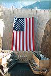This is a picture of the US Flag over Hoover Dam. It is in the Guiness Book of World Records. Just as it had stayed up just long enough to meet the required amount of time, one of the wires snapped.