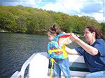 This is Miss Taina and Mommy.  She'll be one shortly, but she was in charge of the party boat on this day