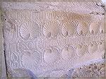 This sepulcre is in the Merovingian crypt at Jouarre in France.  The motifs of its carvings echo motifs found in &quot;oriental&quot; fabrics from that time.