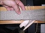 Here's a look at the tablet-woven band in-progress.  The texture you see in this band (the little &quot;V&quot; shapes) is a result of the threading direction of the tablets (that's a subject for Tabl