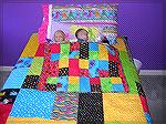 Bed quilt is the turning 20 pattern and the dolly quilt is from the same fabrics