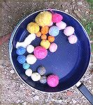 These balls were made by kids ranging in age from 2 through 10, using mohair fiber dyed with Easter Egg dyes.

This is a fun activity with a very nice side-effect:  on the evening after felt-making,