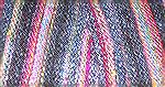 This is a close-up view of the yarns in my new scarf.  The bright, multicolored yarn is the Noro; the dark yarn with shimmery highlights is my handspun (80% Shetland wool, 20% silk).

The wool and s